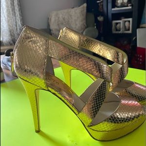 Size 10 Micheal Kors gold shoes